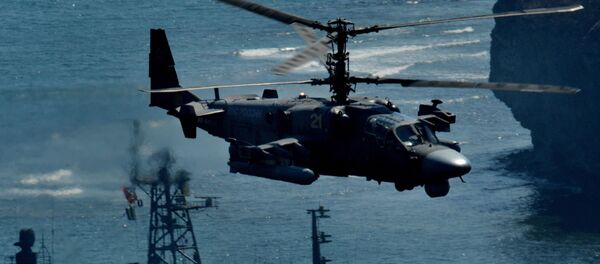 تدعم بالنيران خلال التدريبات الثنائية في بريمورسكي كراي.مروحية كا-52 - سبوتنيك عربي