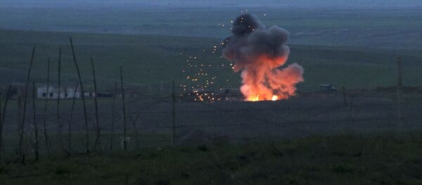 النار  في مكان سقوط طائرة مسيرة أذريجانية في قره باغ - سبوتنيك عربي