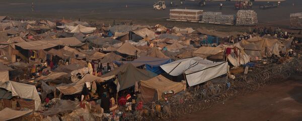 طائرة الأمم المتحدة في مطار مبوكو في بانغوي، جمهورية أفريقيا الوسطى. - سبوتنيك عربي