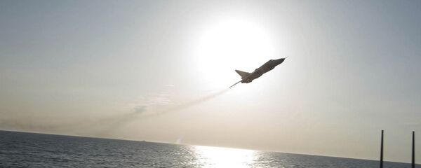 طائرة روسية تحلق قرب بارجة حربية أمريكية طائرة روسية تحلق قرب بارجة حربية أمريكية - سبوتنيك عربي