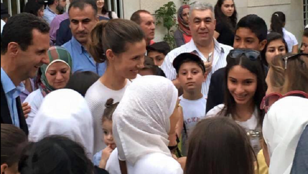 صورة مع الرئيس السوري بشار الأسد صورة مع الرئيس السوري بشار الأسد - سبوتنيك عربي