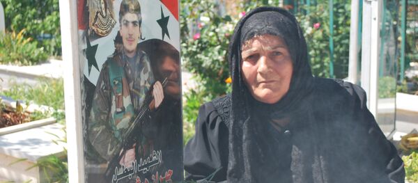 خنساء سوريا - أم قدمت أولادها الخمسة  فدا الوطن - سبوتنيك عربي