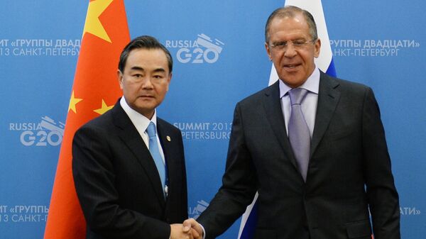 لقاء وزيري الخارجية الروسي والصيني سيرغي لافروف ووانغ يي - سبوتنيك عربي