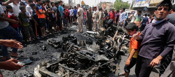 صورة أرشيفية لتفجير سيارة مفخخة في بغداد صورة أرشيفية لتفجير سيارة مفخخة في بغداد - سبوتنيك عربي