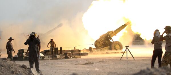 القوات العراقية والحشد الشعبي أثناء تحرير الفلوجة من قبضة داعش القوات العراقية والحشد الشعبي أثناء تحرير الفلوجة من قبضة داعش - سبوتنيك عربي