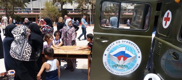 10 مظلات روسية تسقط على أحياء دير الزور 10 مظلات روسية تسقط على أحياء دير الزور - سبوتنيك عربي