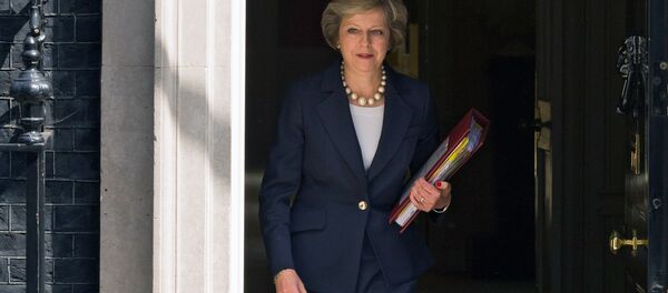 رئيسة وزراء بريطانيا تيريزا ماي - سبوتنيك عربي