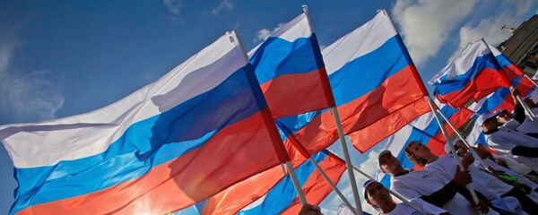 احتفال بيوم العلم الروسي احتفال بيوم العلم الروسي - سبوتنيك عربي