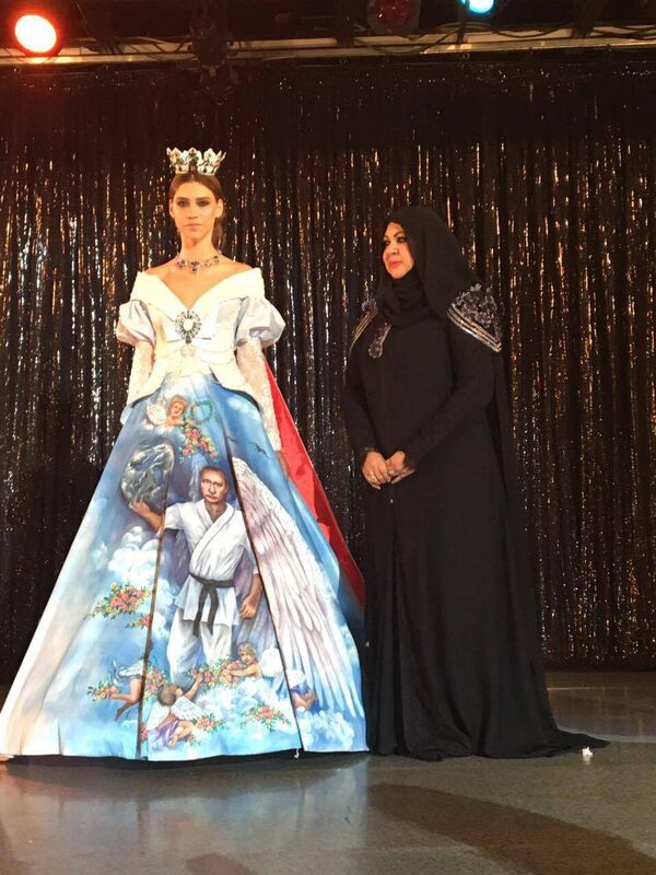 في عرض للأزياء... فستان بصورة بوتين بجناحي ملاك - سبوتنيك عربي