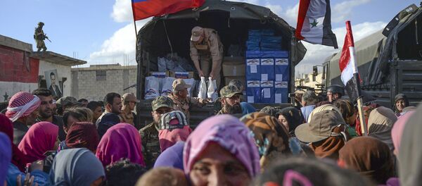 توزيع مواد إغاثية روسية في سوريا - سبوتنيك عربي