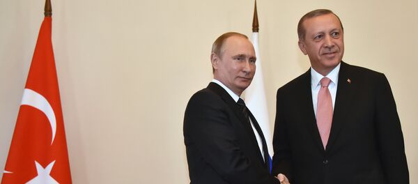 مصافحة بين بوتين وأردوغان - سبوتنيك عربي