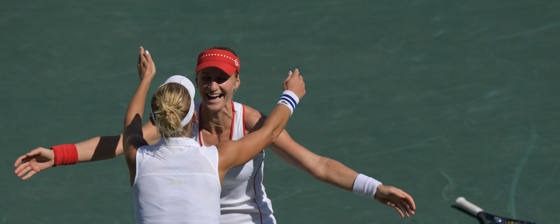 الروسيتان إيكاترينا ماكاروفا وإيلينا فيسنينا في بطولة التنس للسيدات في دورة الالعاب الاولمبية الصيفية الحادية والثلاثين - سبوتنيك عربي, 1920, 07.01.2022