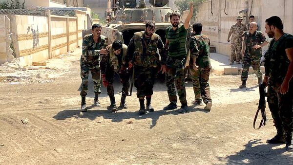 جنود من الجيش السورى خلال تقدم القوات السورية في جنوب غرب حلب - سبوتنيك عربي