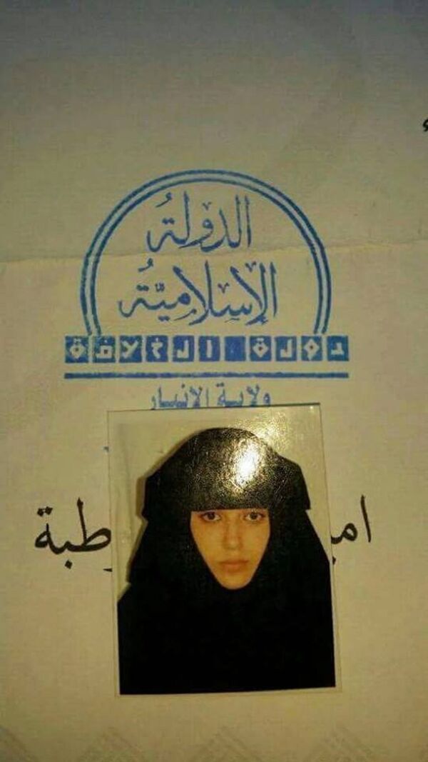 عقد زواج يعود لعنصر مقاتل بتنظيم داعش ولزوجته  - سبوتنيك عربي