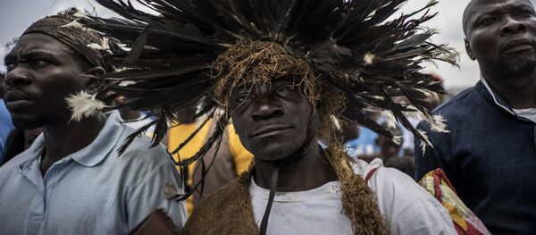 أنصار الرئيس الحالي علي بونغو أونديمبا خلال مسيرة تدعم لانتخابه في ليكوني، الغابون 23 أغسطس/ آب 2016 - سبوتنيك عربي