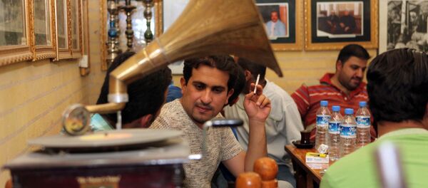مقهى في بغداد مقهى في بغداد - سبوتنيك عربي