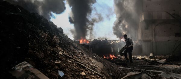 عنصر من جيش الإسلام عنصر من جيش الإسلام - سبوتنيك عربي