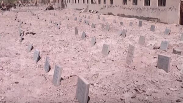 مقبرة جماعية لداعش (صورة أرشيفية) - سبوتنيك عربي