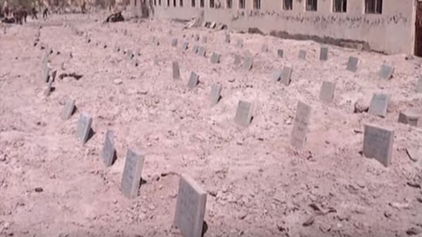 مقبرة جماعية لداعش - سبوتنيك عربي