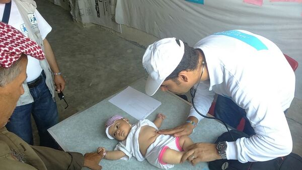 معاينة أطفال حلب المهجرين - سبوتنيك عربي