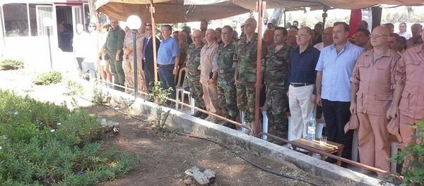 محافظة حمص حملة مساعدات انسانية روسية سورية مشتركة  في ريف حمص الغربي - سبوتنيك عربي