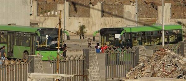 خروج الإرهابيين من حي الوعر - سبوتنيك عربي