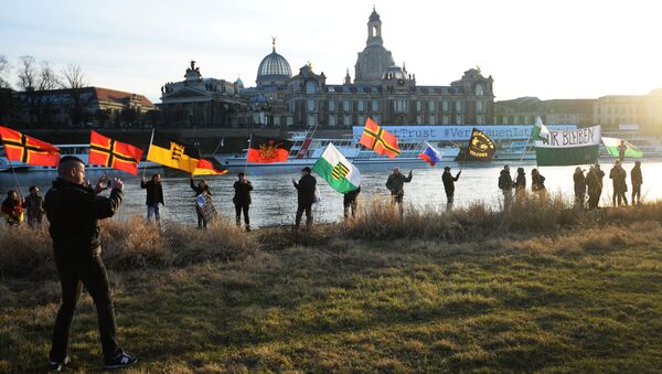 مظاهرة احتجاجية ضد أسلمة أوروبا في درسدن مظاهرة احتجاجية ضد أسلمة أوروبا في درسدن - سبوتنيك عربي