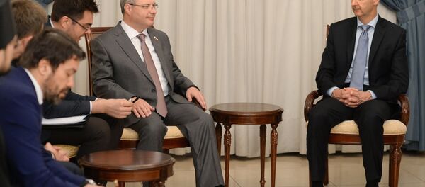 الرئيس السوري بشار الأسد خلال اجتماعه بوفد روسي إلي دمشق، سوريا - سبوتنيك عربي