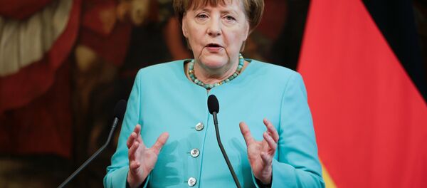 German Chancellor Angela Merkel speaks next to Italian Prime Minister Matteo Renzi (not seen) during a news conference at Chigi Palace in Rome, Italy May 5, 2016. - سبوتنيك عربي