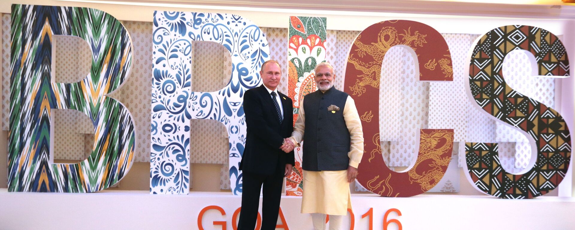 الرئيس الروسي فلاديمير بوتين والرئيس الهندي ناريندرا مودي خلال قمة بريكس في الهند - سبوتنيك عربي, 1920, 23.03.2023