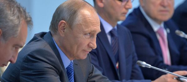 الرئيس الروسي فلاديمير بوتين ورئيس خلال قمة بريكس في الهند - سبوتنيك عربي