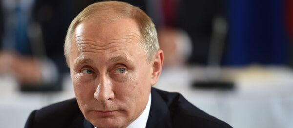 الرئيس الروسي فلاديمير بوتين خلال اجتماع رباعية النورماندي في برلين - سبوتنيك عربي