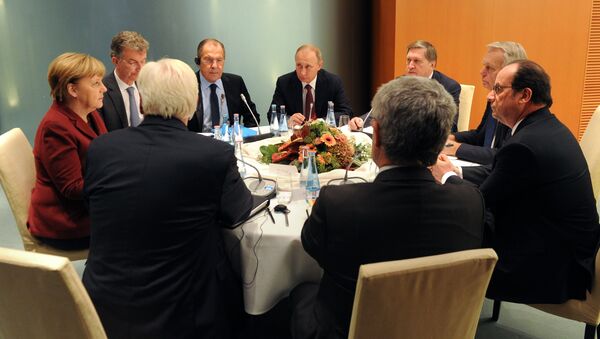 الرئيس الروسي فلاديمير بوتين خلال اجتماع رباعية النورماندي في برلين - سبوتنيك عربي