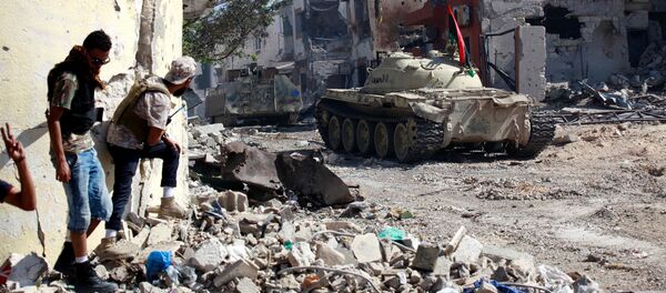 القوات الليبية خلال الاشتباكات مع إرهابيي تنظيم داعش في مدينة سرت، ليبيا 31 أكتوبر/ تشرين الأول 2016 - سبوتنيك عربي