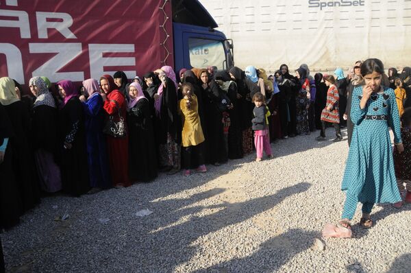 النساء الهاربات من الموصل النساء الهاربات من الموصل - سبوتنيك عربي