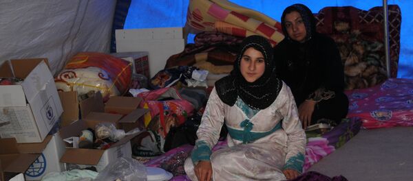 نساء الموصل الهاربات من داعش - حوري جليل - سبوتنيك عربي