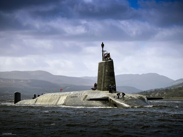 Royal Navy Vanguard Class submarine HMS Vigilant returning to HMNB Clyde after her extended deployment. Royal Navy Vanguard Class submarine HMS Vigilant returning to HMNB Clyde after her extended deployment. - سبوتنيك عربي