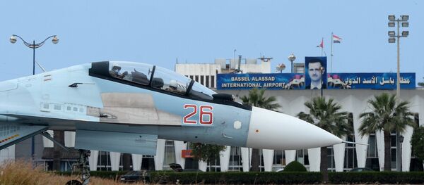 A Russian Su-30 aircaft on a runway at the Hmeimim airbase in Syria - سبوتنيك عربي