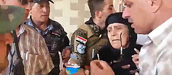 امرأة عراقية تاريخية صمدت بوجه داعش امرأة عراقية تاريخية صمدت بوجه داعش - سبوتنيك عربي