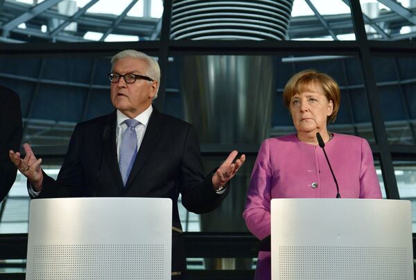 المستشارة الألمانية انجيلا ميركل ووزير الخارجية فرانك وولتر شتاينماير - سبوتنيك عربي