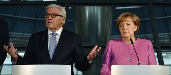 المستشارة الألمانية انجيلا ميركل ووزير الخارجية فرانك وولتر شتاينماير - سبوتنيك عربي