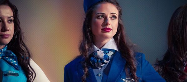 مضيفة طيران (صورة أرشيفية) مضيفة طيران (صورة أرشيفية) - سبوتنيك عربي