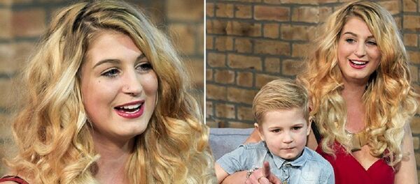 أم شابة تقوم بالتمثيل في الأفلام الإباحية - سبوتنيك عربي