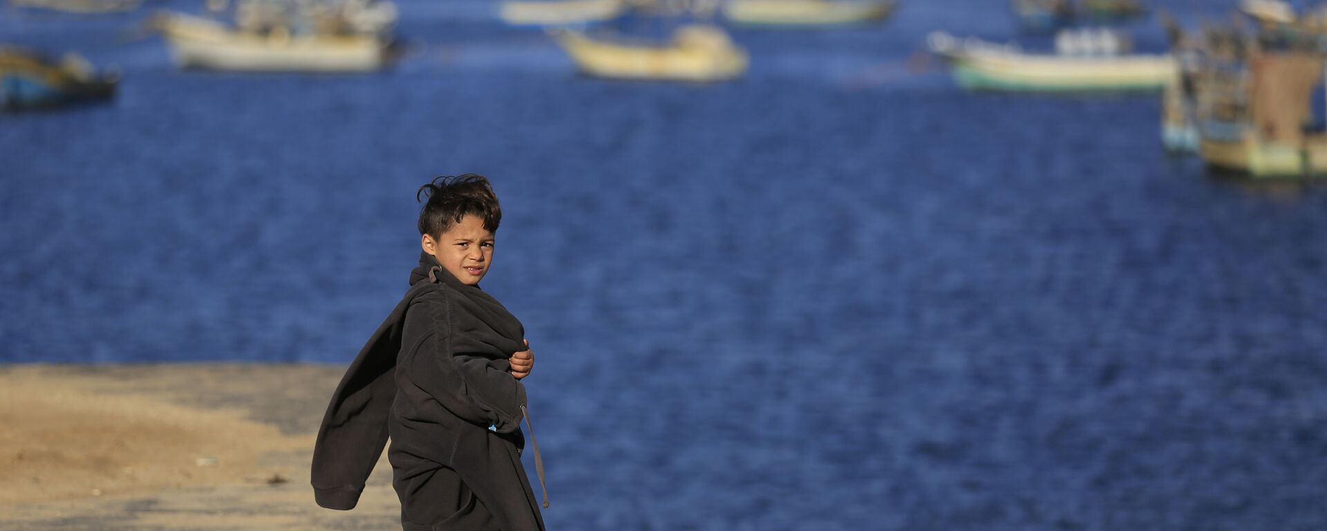 ابن صياد فلسطيني في مدينة غزة، قطاع غزة، فلسطين، 7 ديسمبر/ كانون الأول 2016 - سبوتنيك عربي, 1920, 31.05.2022