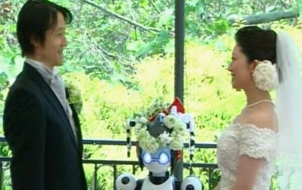 Robot marries bride and groom Robot marries bride and groom - سبوتنيك عربي