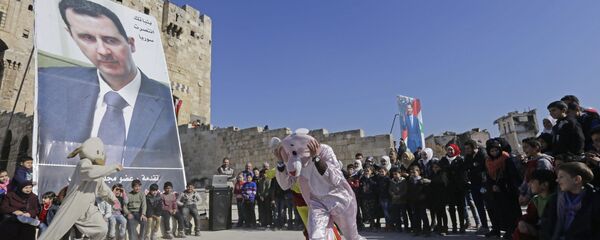 صورة الرئيس بشار الأسد في حلب - سبوتنيك عربي
