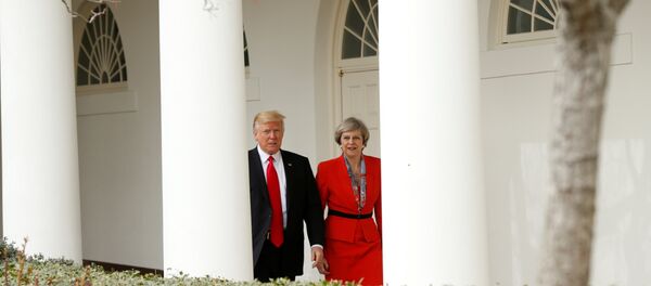 دونالد ترامب وتيريزا ماي - سبوتنيك عربي