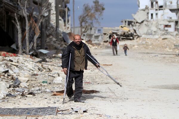 رجل في حلب، سوريا 30 يناير/ كانون الثاني 2017 - سبوتنيك عربي