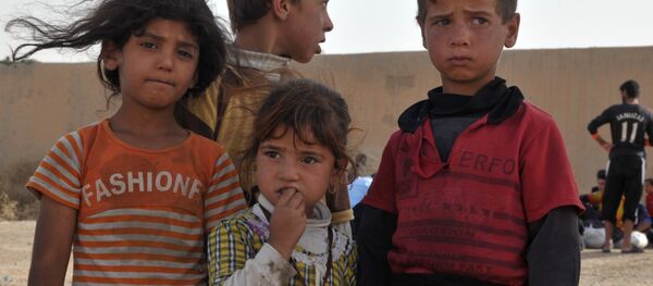 أطفال العراق الهاربين من داعش - سبوتنيك عربي