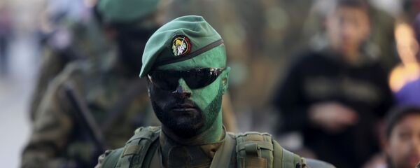 كتائب عزالدين القسام، الجناح العسكري التابع لحركة حماس في قطاع غزة، فلسطين 19 يناير/ كانون الثاني 2017 كتائب عزالدين القسام، الجناح العسكري التابع لحركة حماس في قطاع غزة، فلسطين 19 يناير/ كانون الثاني 2017 - سبوتنيك عربي